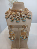 Aqua Blue Jhumka Gold Choker Set with Statement Earrings