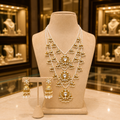 Elegant Gold-Mother of Pearls Rani Haar necklace Set with Jhumka Earrings