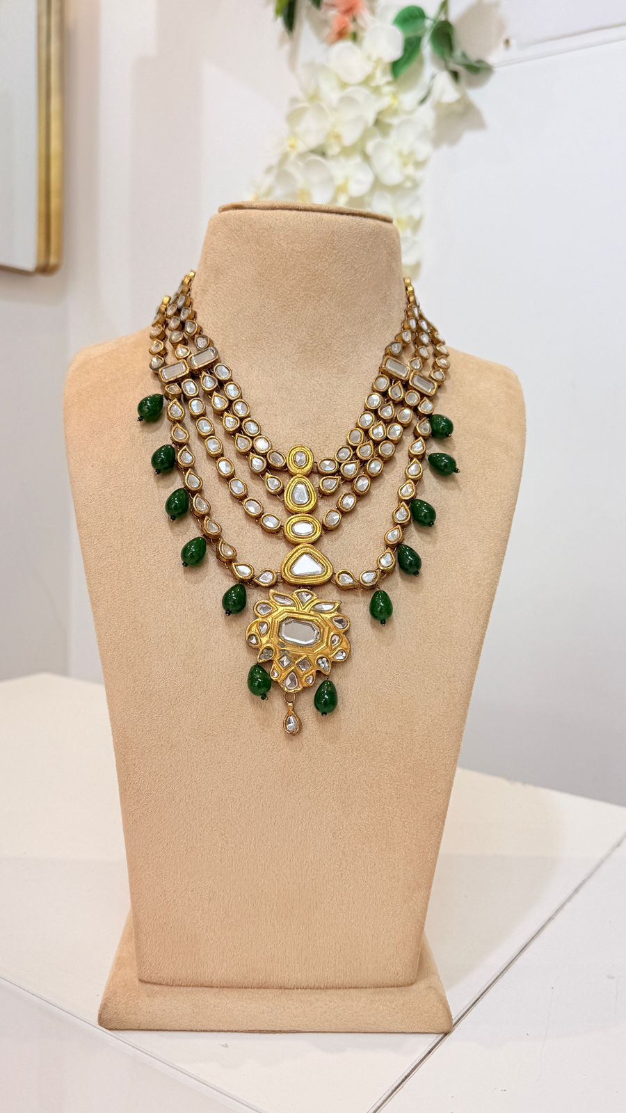 Gold Kundan Layered Necklace with Green Bead Drops