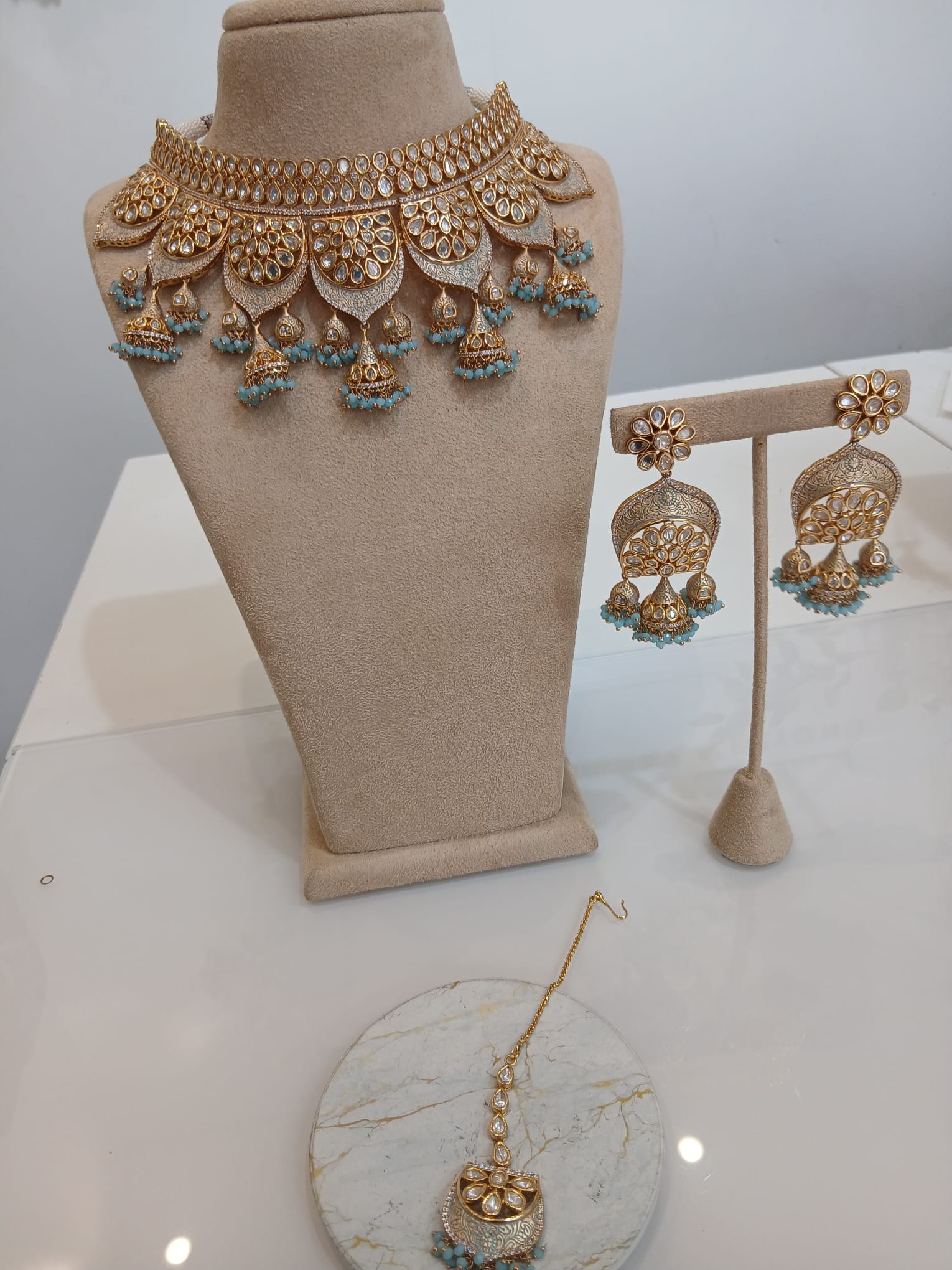 Aqua Blue Jhumka Gold Choker Set with Statement Earrings