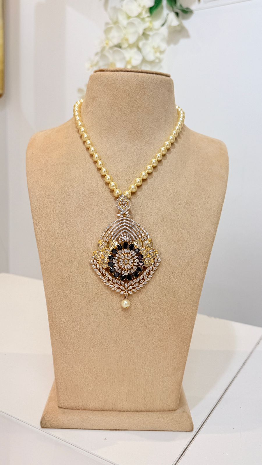Golden Pearl Necklace with Black Floral Statement Pendant