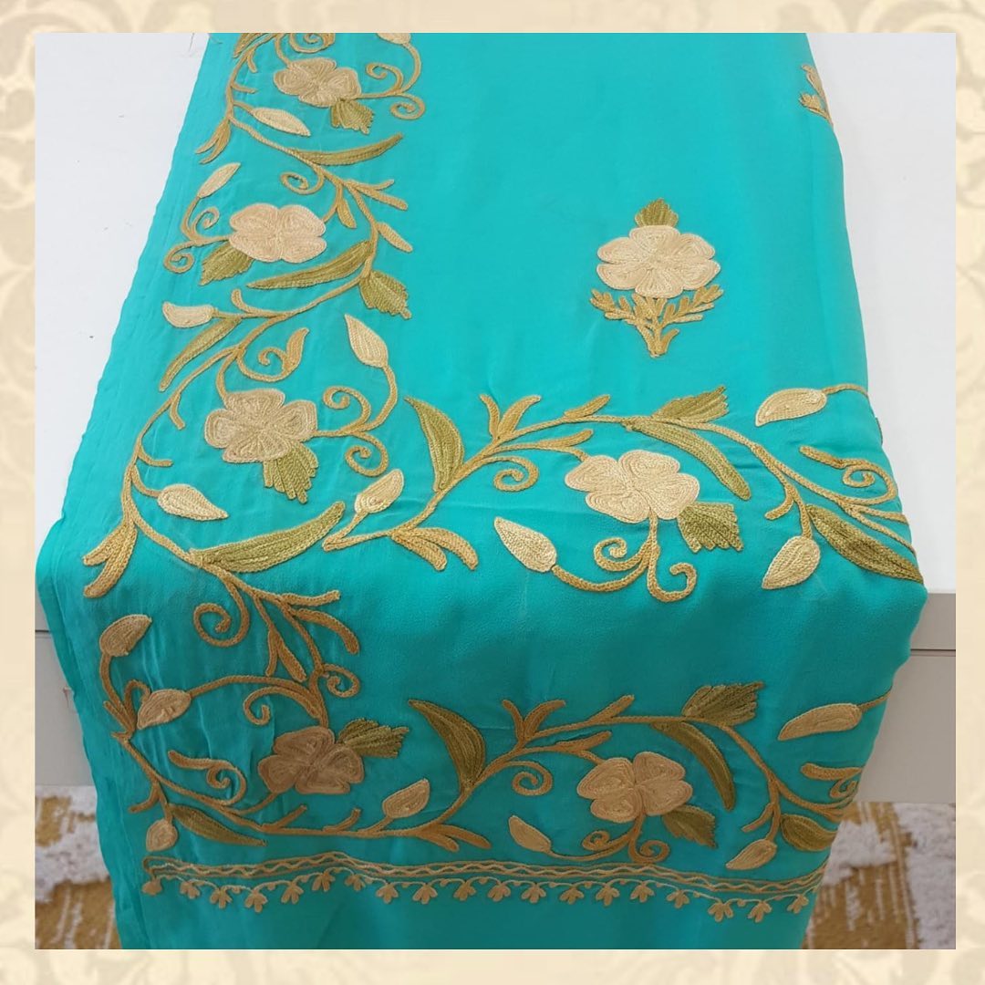 Turquoise Blue Georgette Saree with Golden Floral Creeper Embroidery