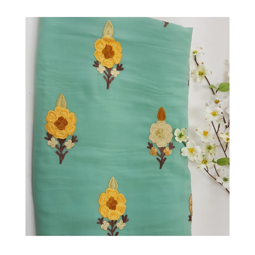Seafoam Green Chiffon Saree with Yellow Sunflower Motifs